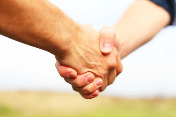 Close-up van mensen schudden handen — Stockfoto