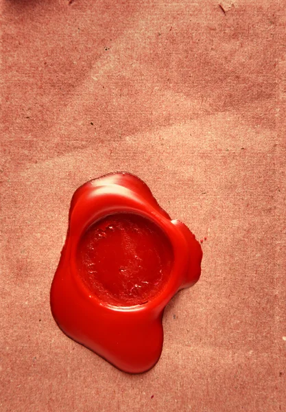 Imagen de sello de cera roja sobre fondo grunge — Foto de Stock