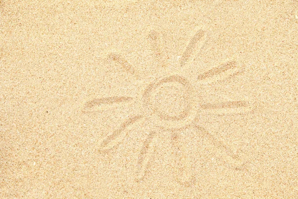 Image of sun drawing on sand — Stock Photo, Image
