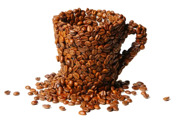 Mug covered with coffee beans — Stock Photo, Image