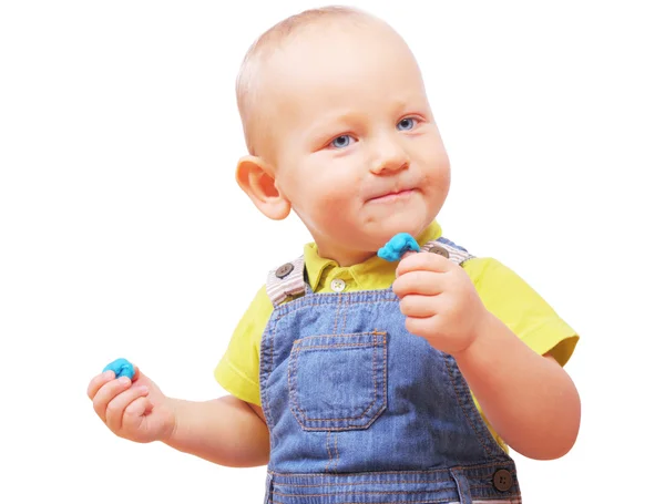 Image of little boy with some stuff in his hands isolated on whi — Stock Photo, Image