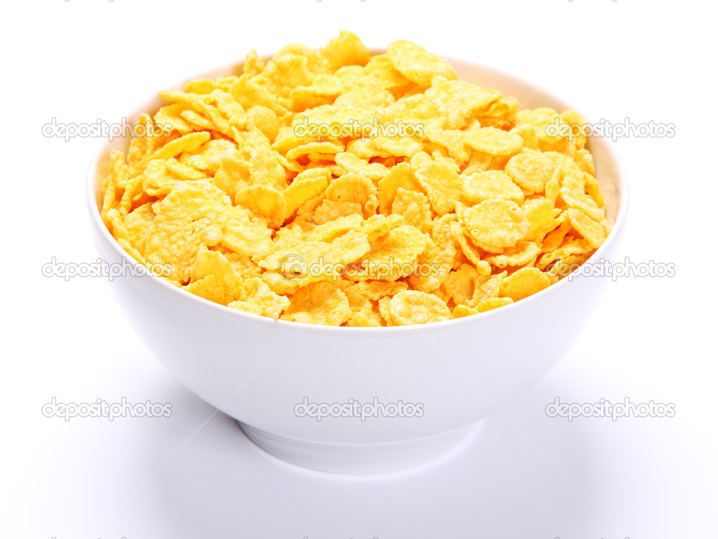 Image of bowl full of cornflakes over white background.