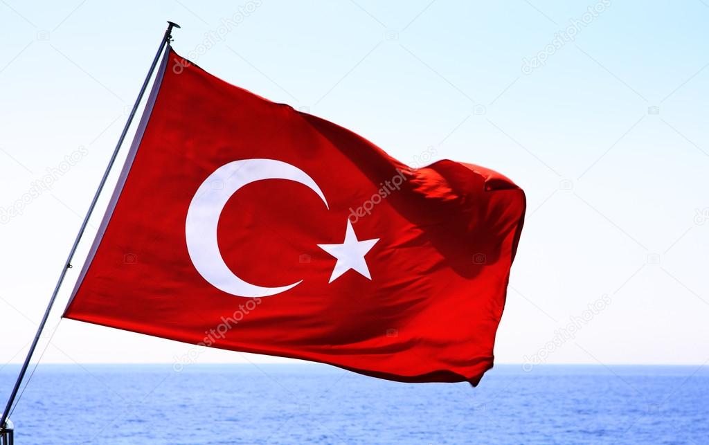 Image of Turkish flag over sea