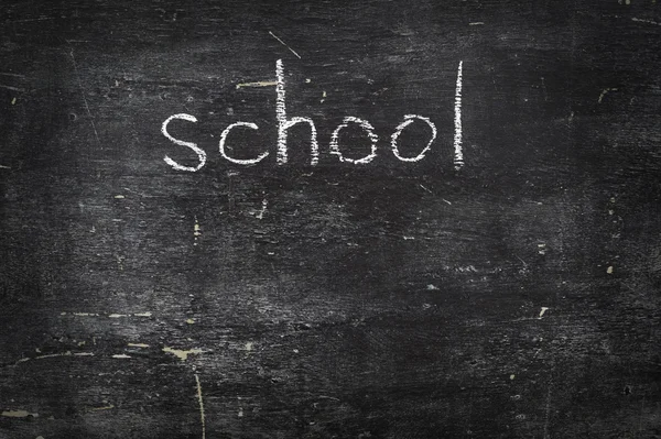 Chalk on black board: school — Stock Photo, Image