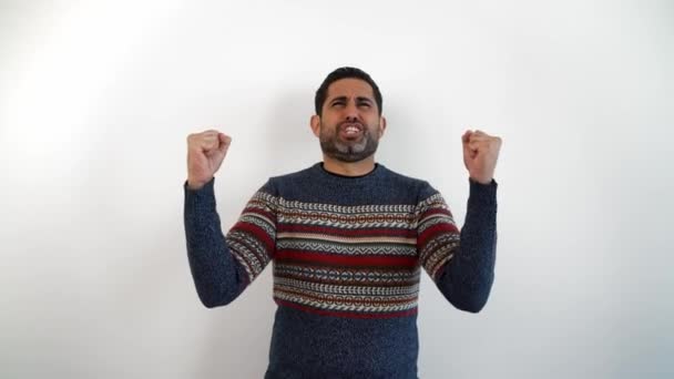 Portrait Joyous Caucasian Man Celebrating Raised Hand Success Indoor Studio — 图库视频影像