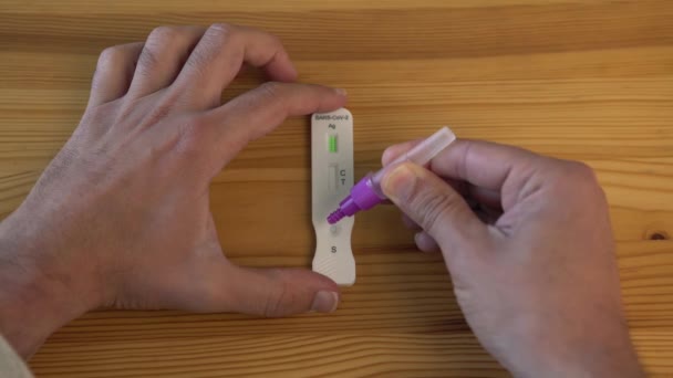 Man Placing Sample Covid Antigen Diagnostic Test Deviceand Have Negative — Stock Video