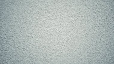 Soyut beyaz damlalı duvar arkaplanı. Taş duvar kağıdından kapatılmış. Yeni taş duvar şehir dokusu. Ev veya ofis tasarımı arkaplanı