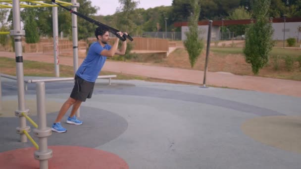 Caucasian Man Workout Suspension Trx Street Young Active Guy Does — Vídeo de Stock