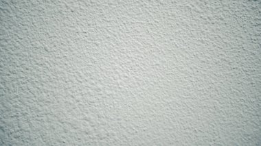 Soyut beyaz damlalı duvar arkaplanı. Taş duvar kağıdından kapatılmış. Yeni taş duvar şehir dokusu. Ev veya ofis tasarımı arkaplanı