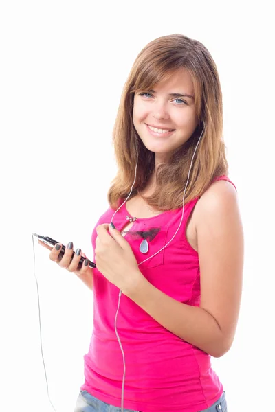 Smiling girl with a mobile phone and headphones — Stock Photo, Image