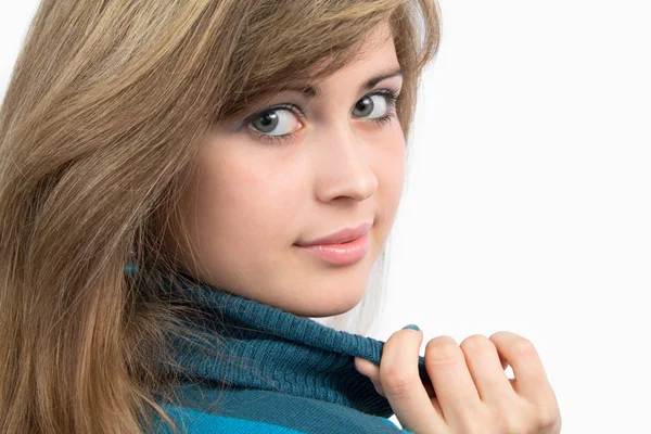 Portrait of beautiful girl holding sweater's neck — Stock Photo, Image
