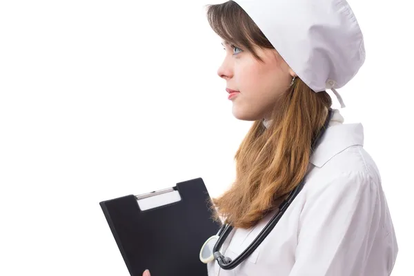 Young doctor with with phonendoscope on neck and a folder in hands — Stock Photo, Image