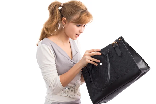 Menina bonita surpreso com smth em sua bolsa — Fotografia de Stock