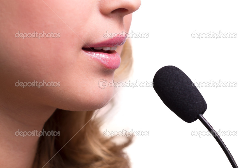 Lips of girl speak into the microphone — Stock Photo © fantom_rd 41048677