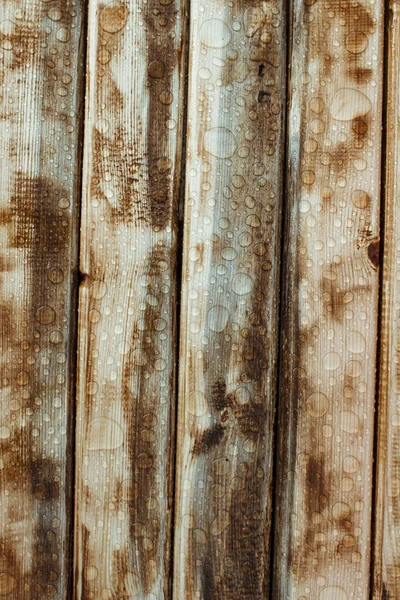 Vertikaler Hintergrund Aus Lackiertem Gebranntem Holz Mit Glänzenden Wassertropfen Aus — Stockfoto