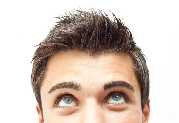 Young attractive man face looking up — Stock Photo, Image