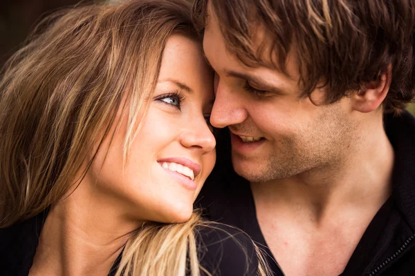 Romantic, tender moment of a young attractive couple. close up portrait — Stock Photo, Image