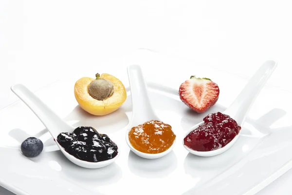 Blueberry-, apricot- and strawberry jam — Stock Photo, Image