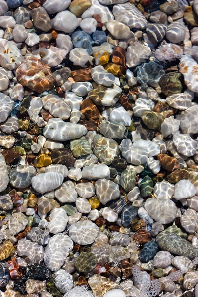 Stenar och vatten Stockbild