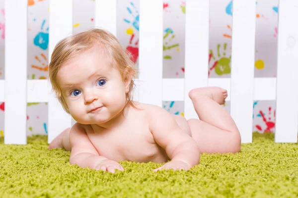Pretty baby with big blue eyes Stock Photo