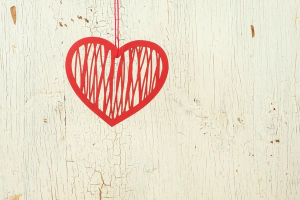 Red paper heart on a old white wood — Stock Photo, Image