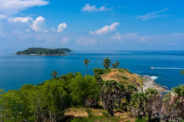 Amazing landscape nature scenery view of Beautiful tropical sea with Sea coast view in summer season image by Aerial view drone top down, high angle view Located at Laem Promthep Phuket Thailand.