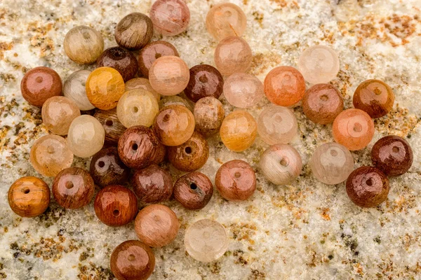 Rutiled quartz beads — Stock Photo, Image