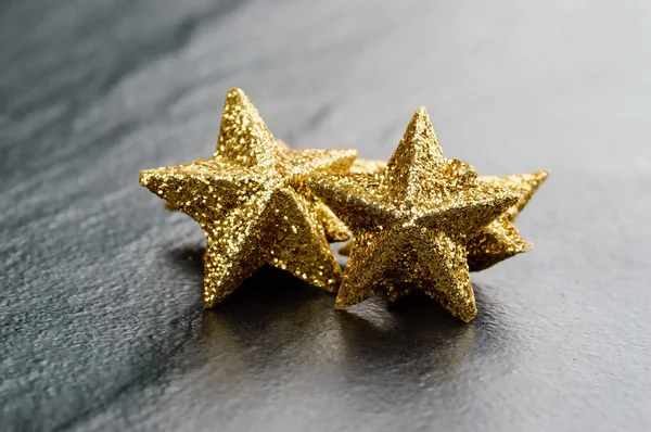 Golden sparkling stars — Stock Photo, Image