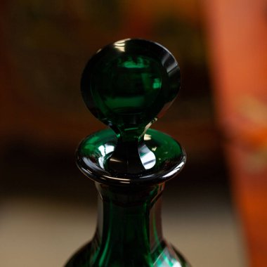 green antique glass close-up in a luxury interior. bohemian glass closeup