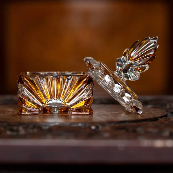 Vintage glass ornate shape jewelry  box. vintage glass jewelry box, bohemian glass. Vintage ornate shape jewelry box in luxyry interior.