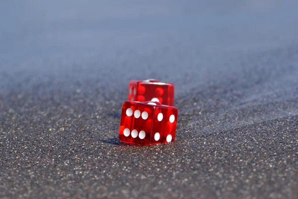 Dices on the beach — Stock Photo, Image