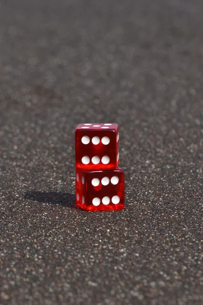 Dices on the beach — Stock Photo, Image