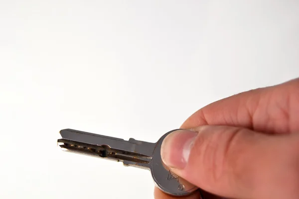 Hand with key — Stock Photo, Image