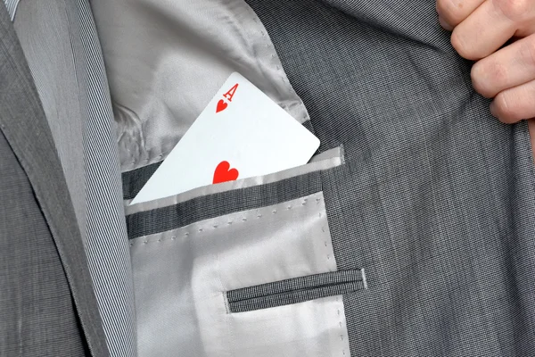 Man with ace in the pocket of the jacket — Stock Photo, Image