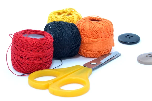 Colored threads,scissors and buttons — Stock Photo, Image