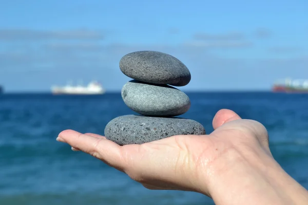 Zen stones in hand — Stock Photo, Image