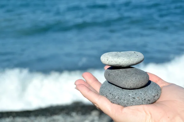 Zen stones in hand — Stock Photo, Image