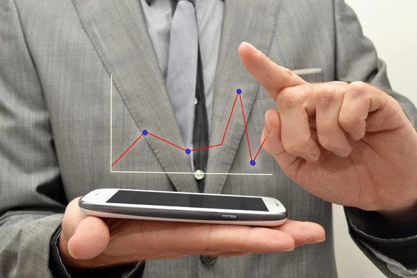 Business man with graph — Stock Photo, Image