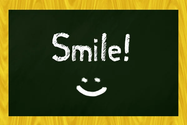 Blackboard with the word "smile" written — Stock Photo, Image