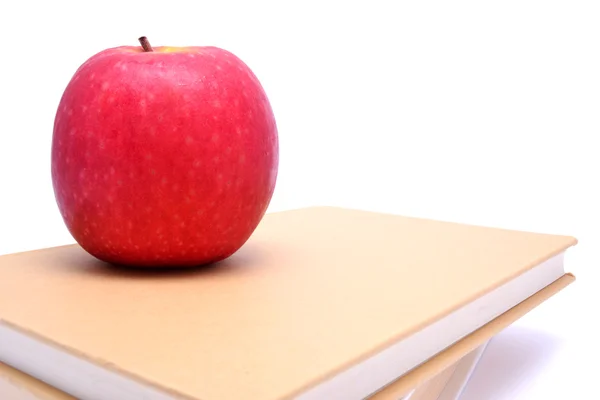 Manzana y libros — Foto de Stock