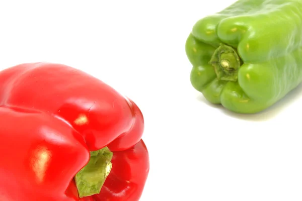 Green and red peppers — Stock Photo, Image