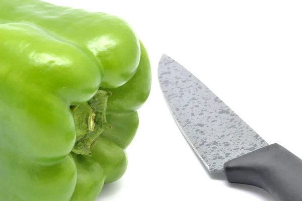 Pepper and knife — Stock Photo, Image