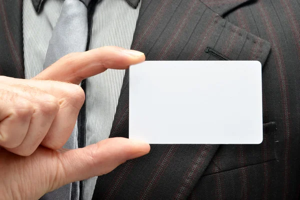 Businessman with card — Stock Photo, Image