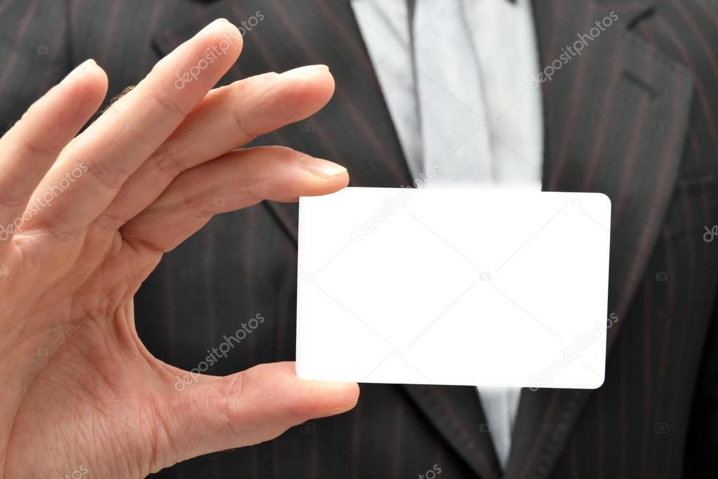 Man with a white card in hand