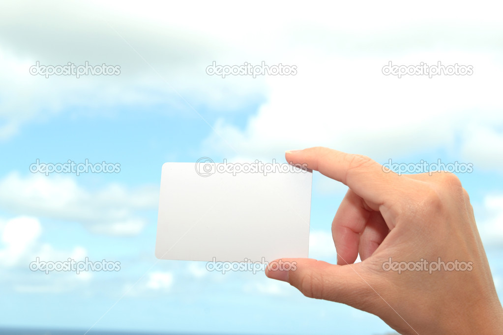 Man with a white card in hand