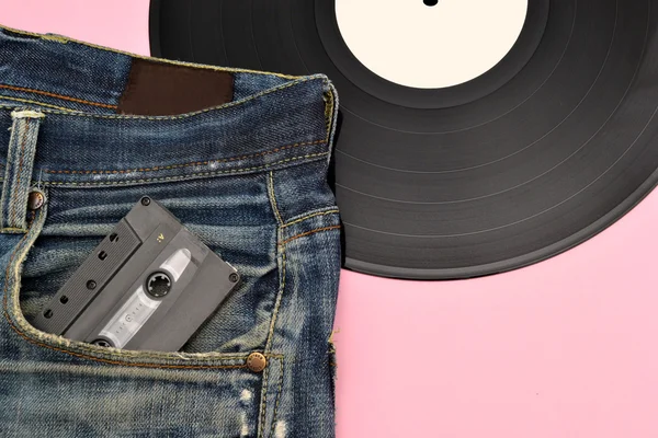 Jeans en vinyl record — Stockfoto