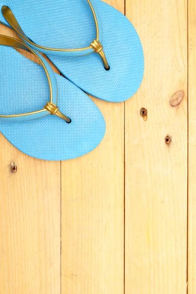 Beach slippers on wood — Stock Photo, Image