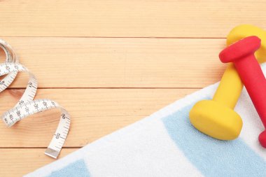 mezura, dambıl ve plaj havlusu