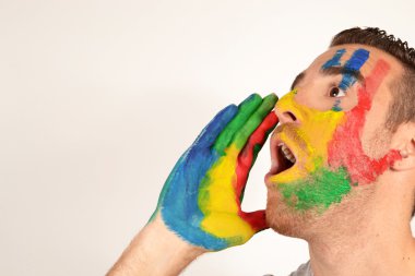 Young man screaming with hand painted face clipart