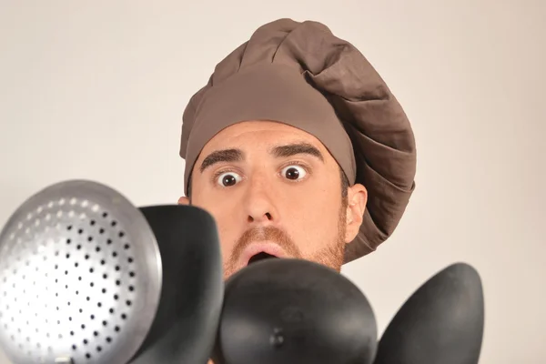 Choosing cookware cook — Stock Photo, Image